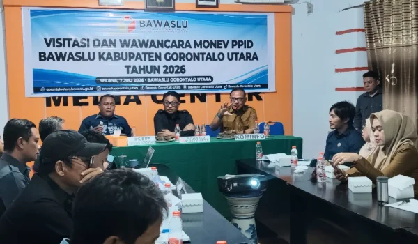 Monitoring dan evaluasi keterbukaan informasi publik oleh Komisi Informasi Provinsi (KIP) Gorontalo di Badan Pengawas Pemilu (Bawaslu) Kabupaten Gorontalo Utara, Selasa (7/7/2026).