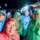 Keseruan Tak Terbendung: Penonton Kenakan Jas Hujan Plastik Warna Warni saat Konser Kangen Band di Masamba